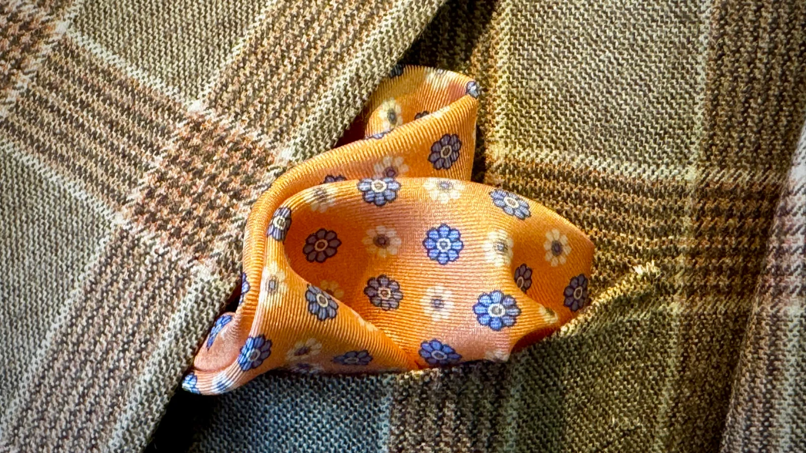 a pocketsquare in a jacket