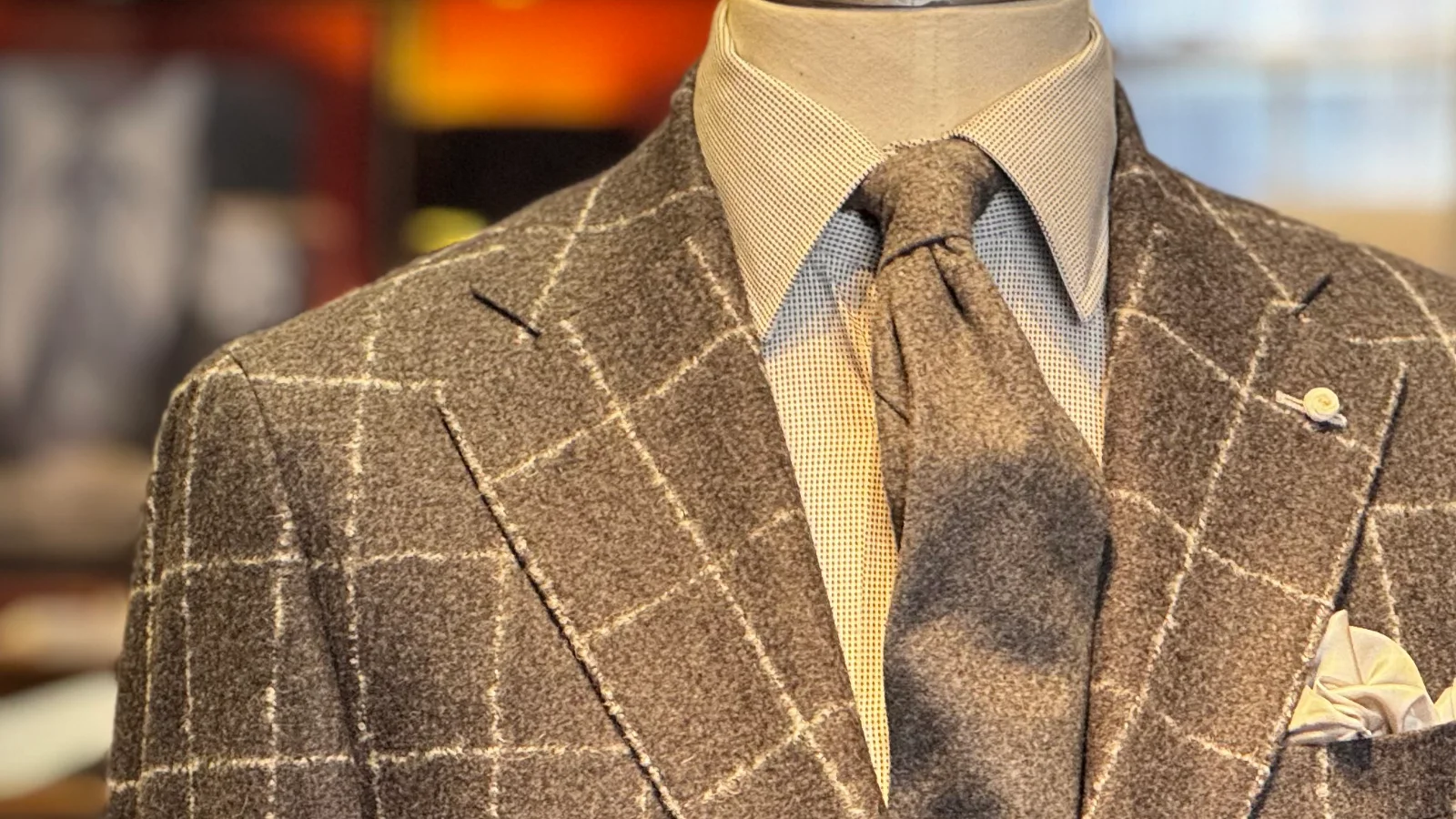 a sports coat and tie