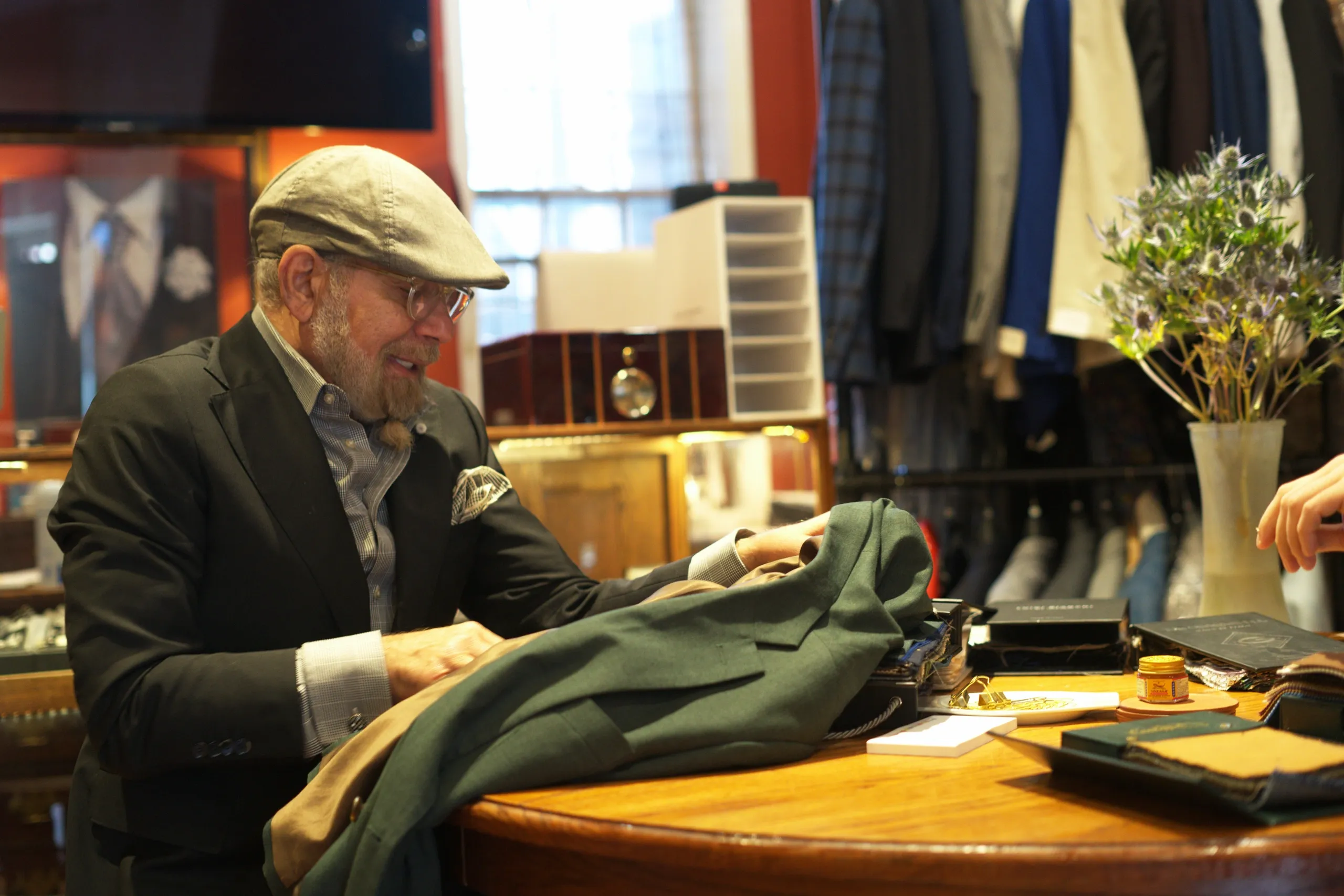 Client and Victor discussing a suit